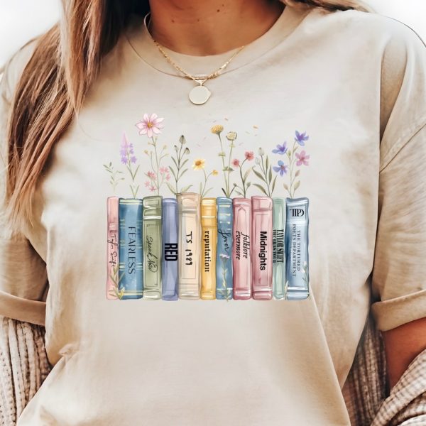 Book albums with wild flowers, eras tour including Tortured Poets Department album, Unisex Heavy Cotton Tee